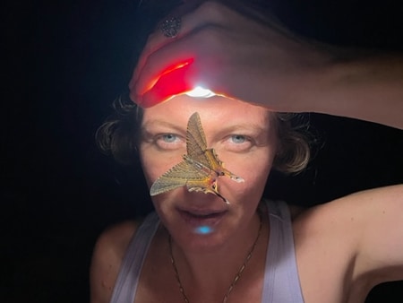 butterfly on guest at Caya Shobo master plant dieta retreat