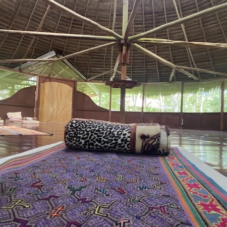 Shipibo tela weaving in maloka at Caya Shobo, Peru